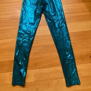 Sparkly metallic teal lamé stretch leggings.